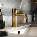 Imagen de Grifería de lavatorio Monocomando bajo de mesada Signature Oro cepillado